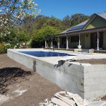 Swimming Pool in Front of Green House — Landscape Service in Australia