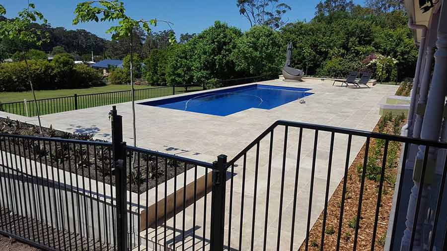 Black Fence Beside the Pool — Landscape Service in Australia